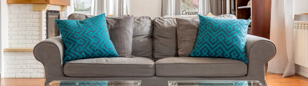 living room sofa with decorative pillows