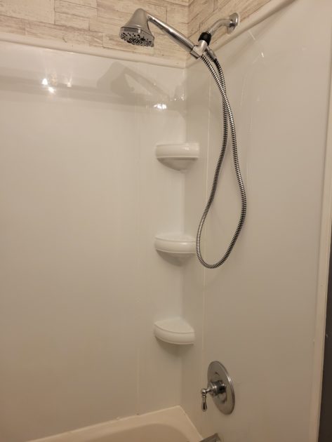 clean bathroom view of shower head