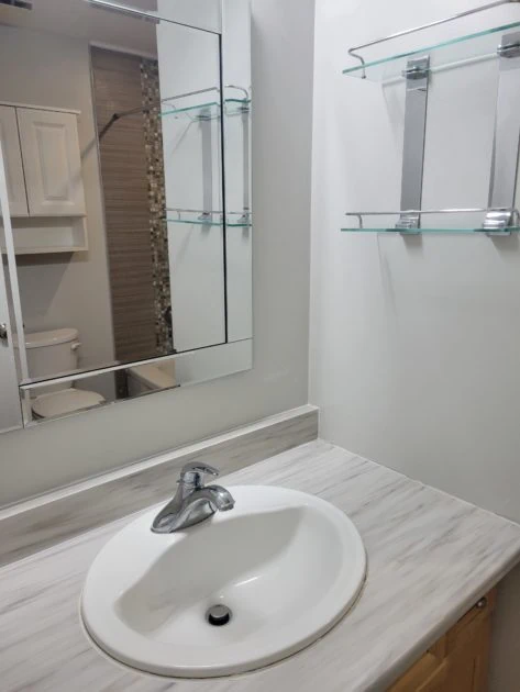 cleaned bathroom view of vanity and sink