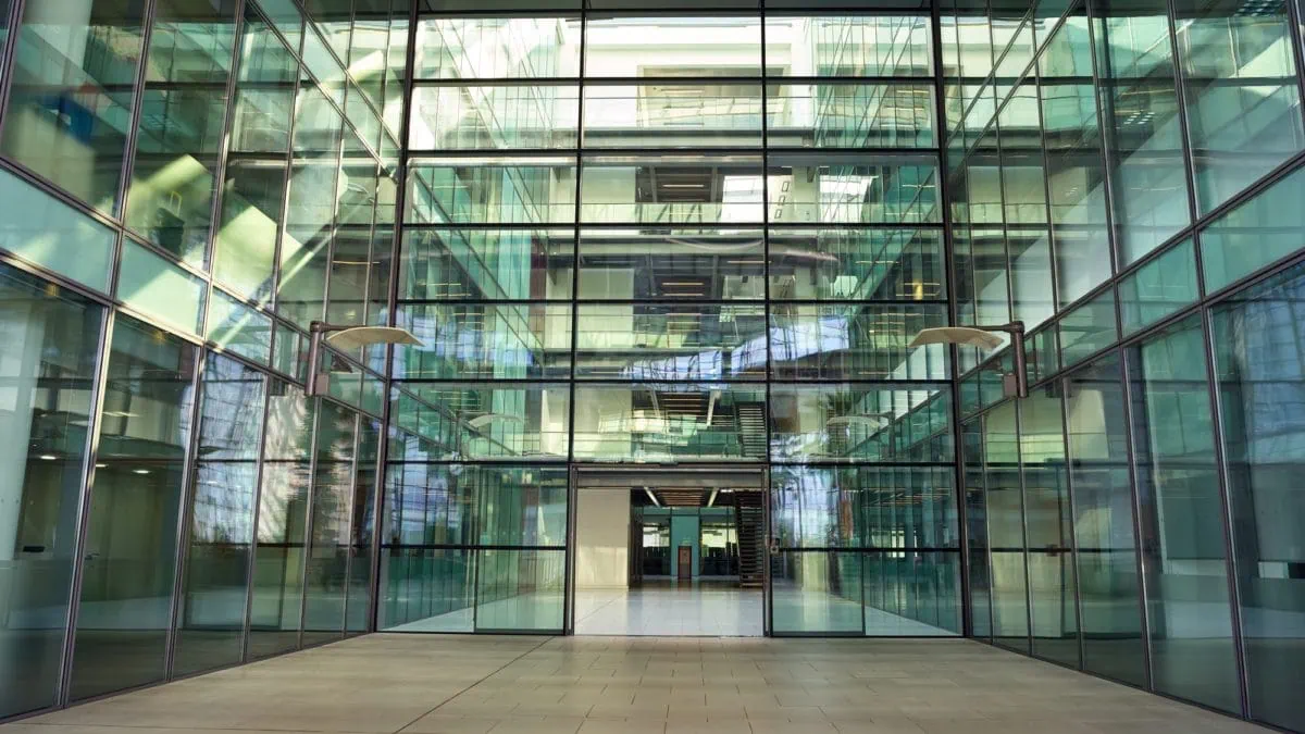 Interior View From Modern Office Lobby Of Empty Floors And Staircases