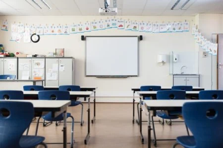 Empty classroom with whiteboard