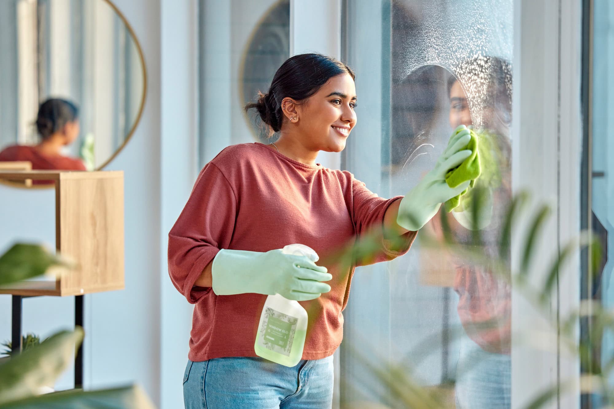 woman cleaning with ecofriendly cleaning solution